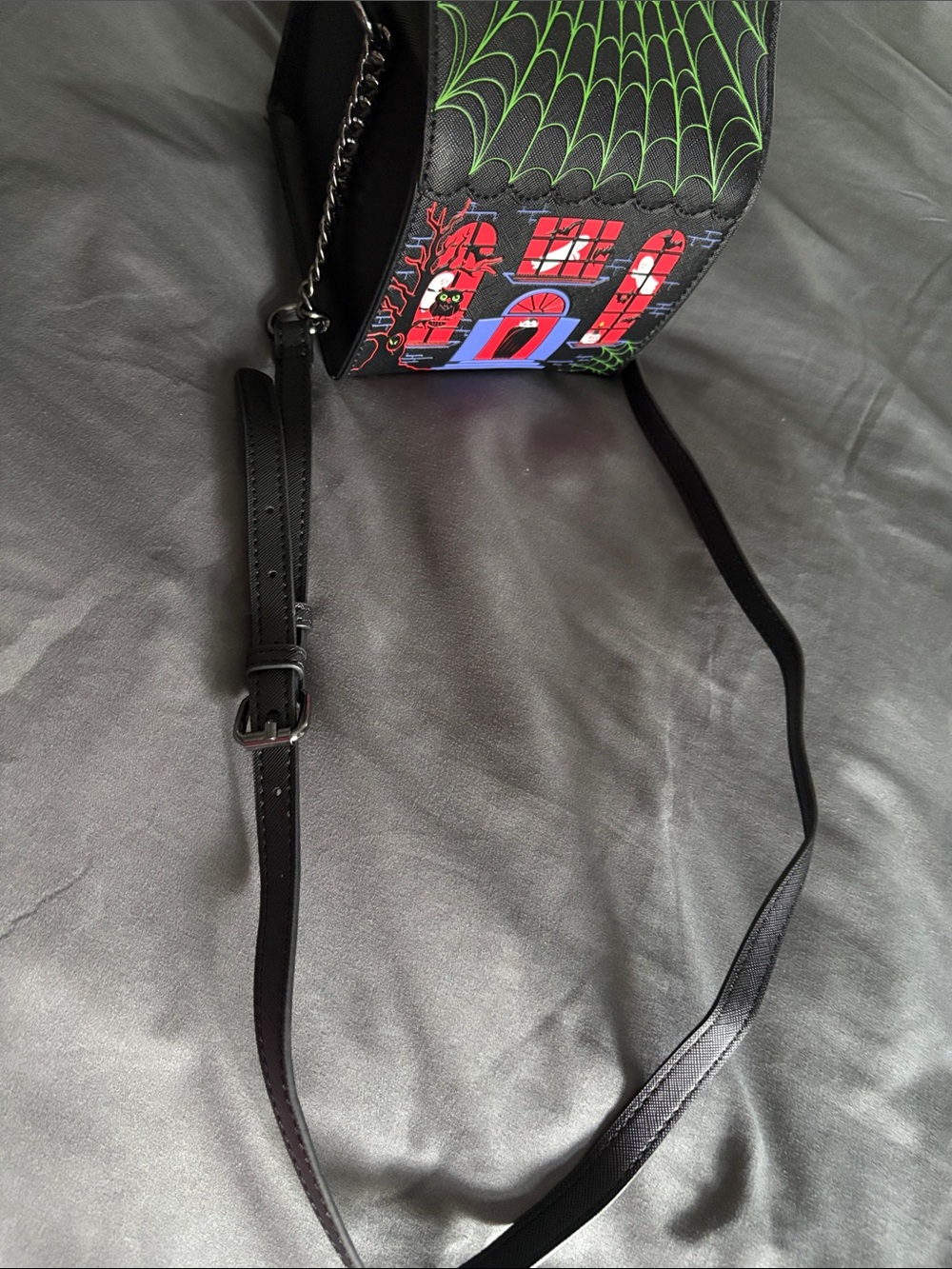 MAD Engine Black Crossbody Bag with Green, Red & Blue Haunted House Design - Picture 5 of 5